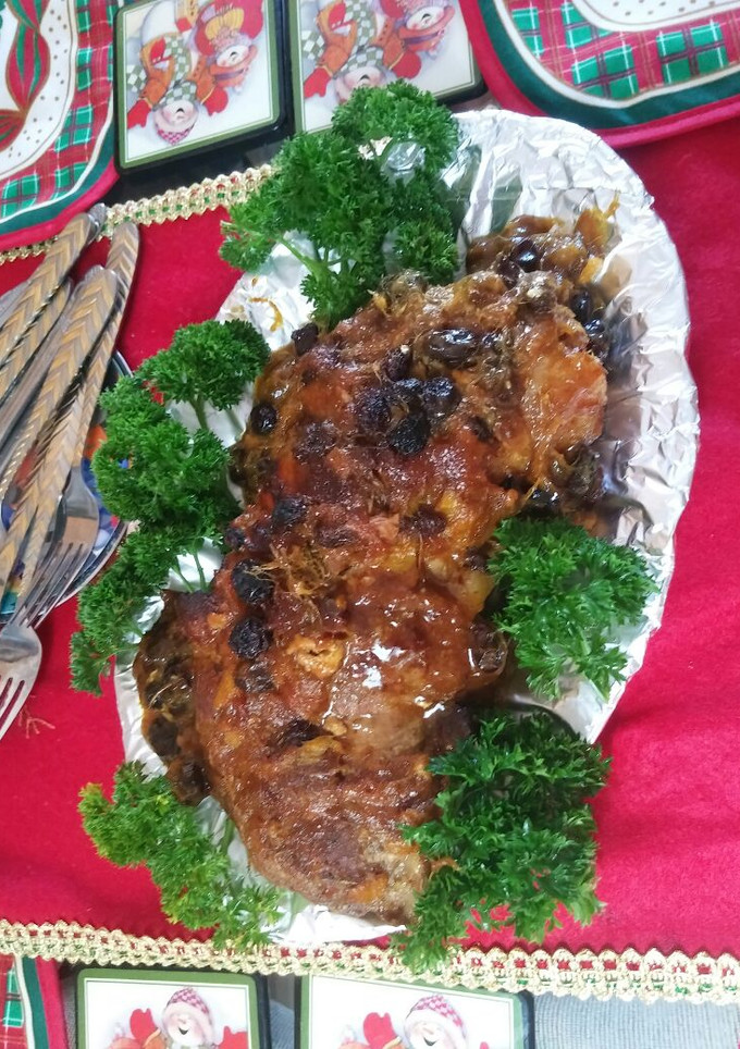 Una foto de Lomo de cerdo con salsa de mango y uvas pasas