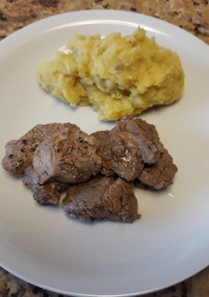 Una foto de Porco a vinha de'alhos (Cerdo al vino y ajo)