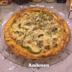 A picture of Without Oven Chicken Tikka cheese Pizza 🤗.
