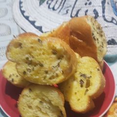A picture of Garlic butter and herbs,baguetes.