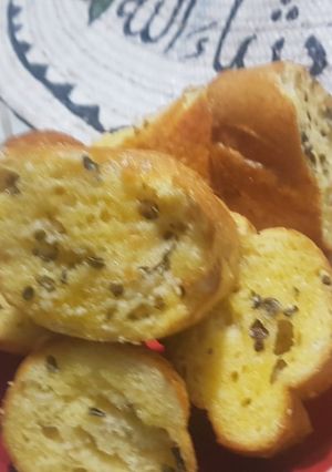 A picture of Garlic butter and herbs,baguetes.