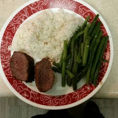 A picture of Venison Tenderloins with bacon.