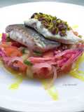 Tranci di orata con salsa d'arance, insalatina, e tapenade di pistacchi e olive taggiasche tritate