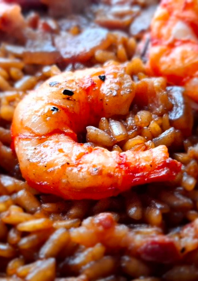 Una foto de Arroz con carabineros y guanciale
