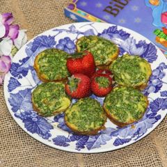 Baked Eggs & Spinach in Sweet Potato Cups A picture of Baked Eggs & Spinach in Sweet Potato Cups.