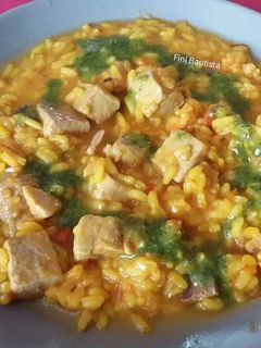Una foto de Arroz caldoso con atún