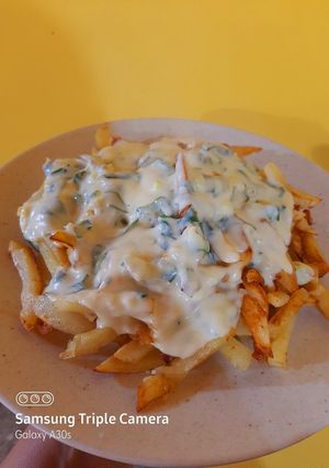 Una foto de Papas con crema de verdeo