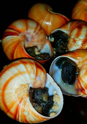 A picture of Mike's Escargots À La Bourguignonne & Parsley Salad.