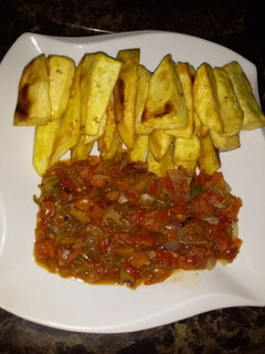 A picture of Sweet potatoes and sauce.