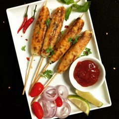 A picture of Curd Rice Seekh Kebab.