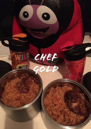 A picture of Jollof rice and turkey.