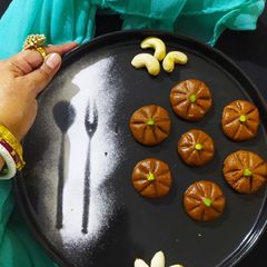 A picture of Nolen guder Sandesh/ Sandesh with date palm jaggery.
