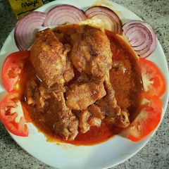 A picture of Chicken drumstick curry.