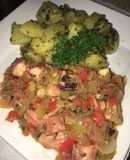 Pulpo al ajillo con vegetales y papas salteadas