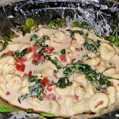 A picture of Larry's crockpot spinach and cheese tortellini.