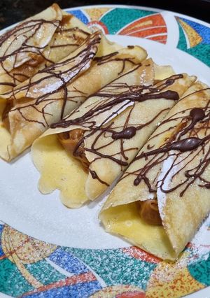 Una foto de PANQUEQUES DE DULCE DE LECHE Y CHOCALATE ❤️