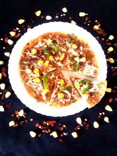 કોનૅ પાલક રવા પીઝા રેસીપી મુખ્ય ફોટો