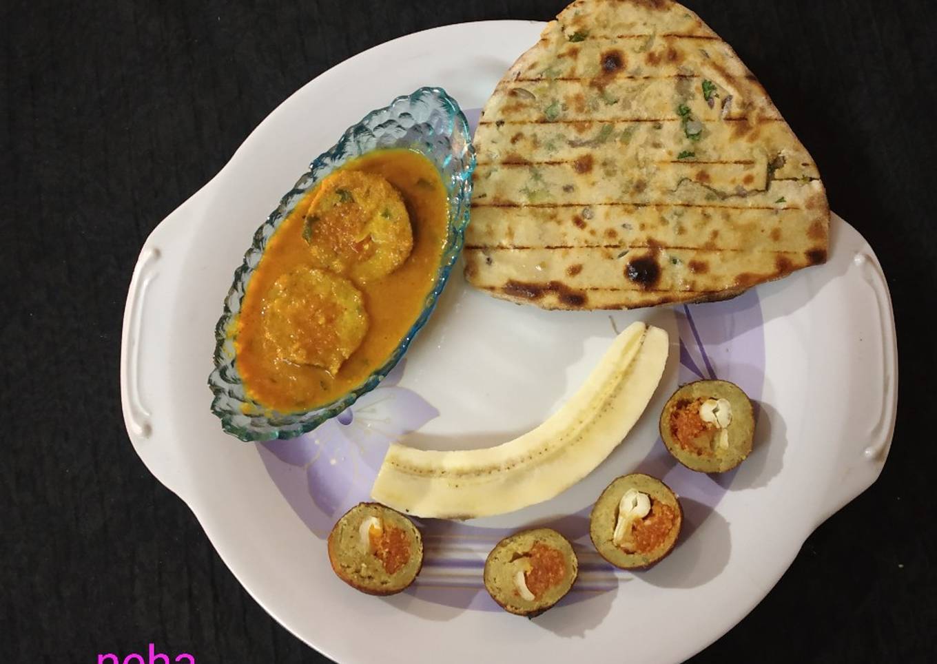 Banana kofta stuffing with carrot halwa