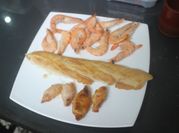 Una foto de gambitas fritas