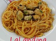 Una foto de mejillones en escabeche