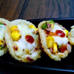 Mini Pizza Cups in Appe Pan A picture of Mini Pizza Cups in Appe Pan.