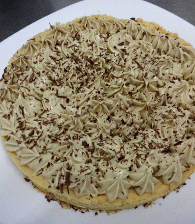 Une photo de Tarte a la pate sable creme moka mousline