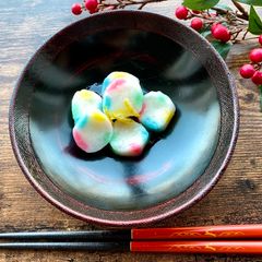 A picture of Mochi Dumplings in Ginger Syrup.