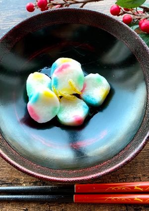 A picture of Mochi Dumplings in Ginger Syrup.
