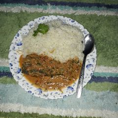 A picture of Rice and fish sauce with coconut.