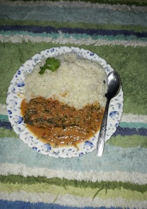 A picture of Rice and fish sauce with coconut.