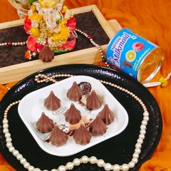 A picture of Chocolate Modak 😋🌹 chocolate Mawa modak 😋😋.