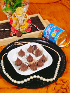 A picture of Chocolate Modak 😋🌹 chocolate Mawa modak 😋😋.