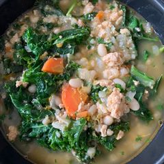 A picture of White Bean Soup with Turkey, Kale, and Lemon.