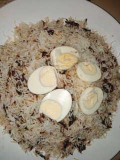 A picture of Rice with fried onions and eggs.. #endyearchallenge.