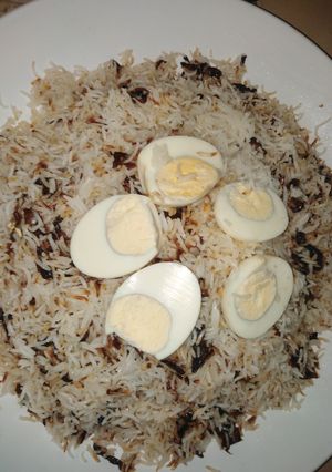 A picture of Rice with fried onions and eggs.. #endyearchallenge.