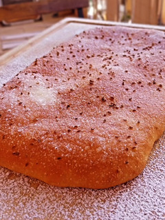 Una foto de Coca brioche v3 de azúcar y anís