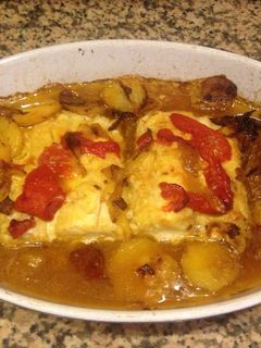 Una foto de Lomos de merluza al horno