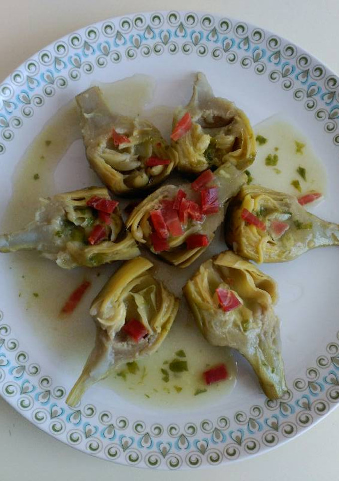 Una foto de Alcachofas en salsa verde