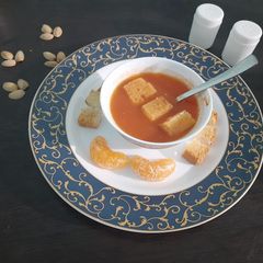 A picture of Tomato with carrot soup.