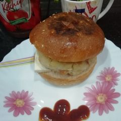 A picture of Poha Aloo Tikki Burger.