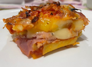 Foto di Patate al forno con scamorza affumicata e prosciutto cotto