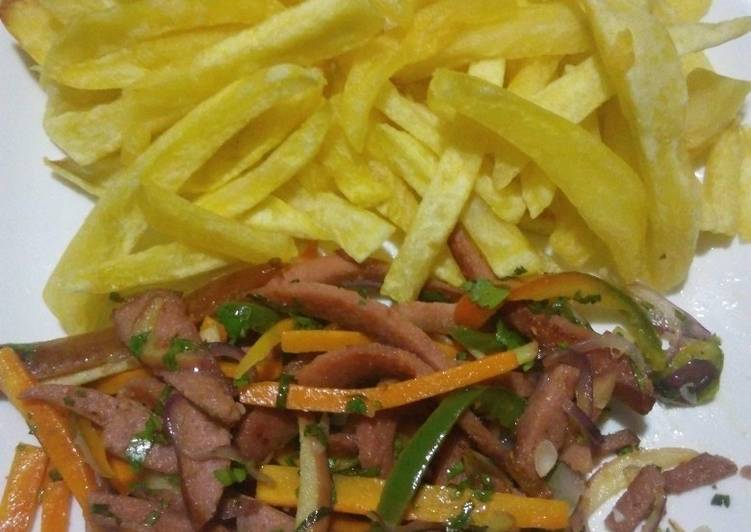Plain french fries and smokies with mixed veggies