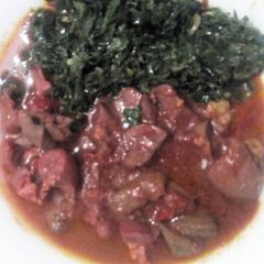 Sukuma wiki with stewed kidney A picture of Sukuma wiki with stewed kidney.