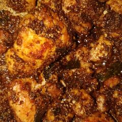 A picture of Chicken ghee roast no onion no tomato.