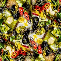 A picture of Broccoli Pizza with Zucchini.