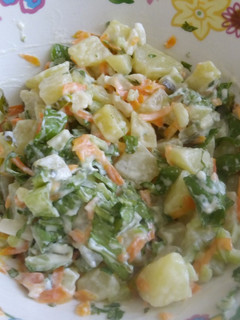 Una foto de Ensalada de papas... algo diferente..