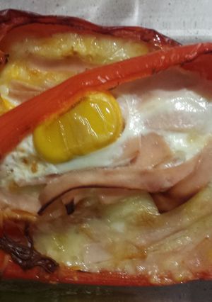 A picture of Red Bell Peppers Stuffed with Ham, Cheese, and Egg.