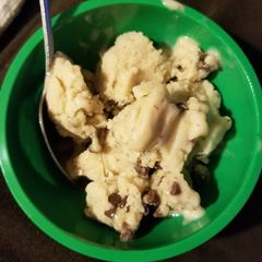 A picture of Banana ice cream with chocolate chips.