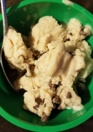 A picture of Banana ice cream with chocolate chips.