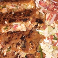 A picture of Desi tortilla wrap fusion dish.